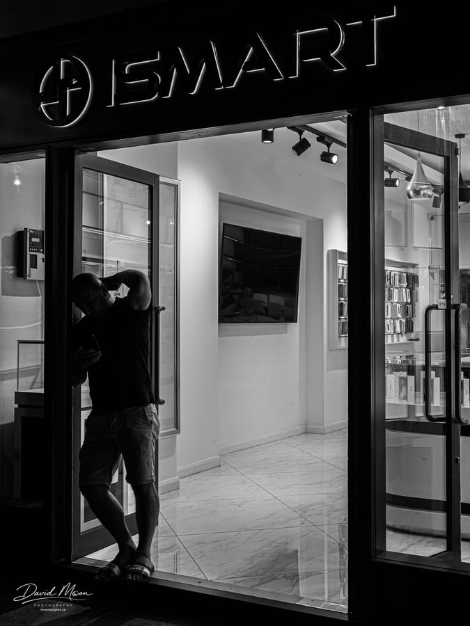 Man at an iSmart Storefront