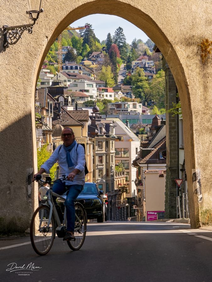 Cyclist beneath the Old City Arch