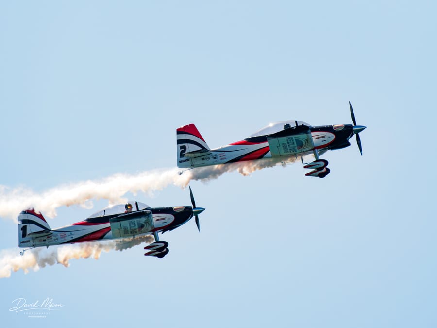 Redline Pair Climbing Together