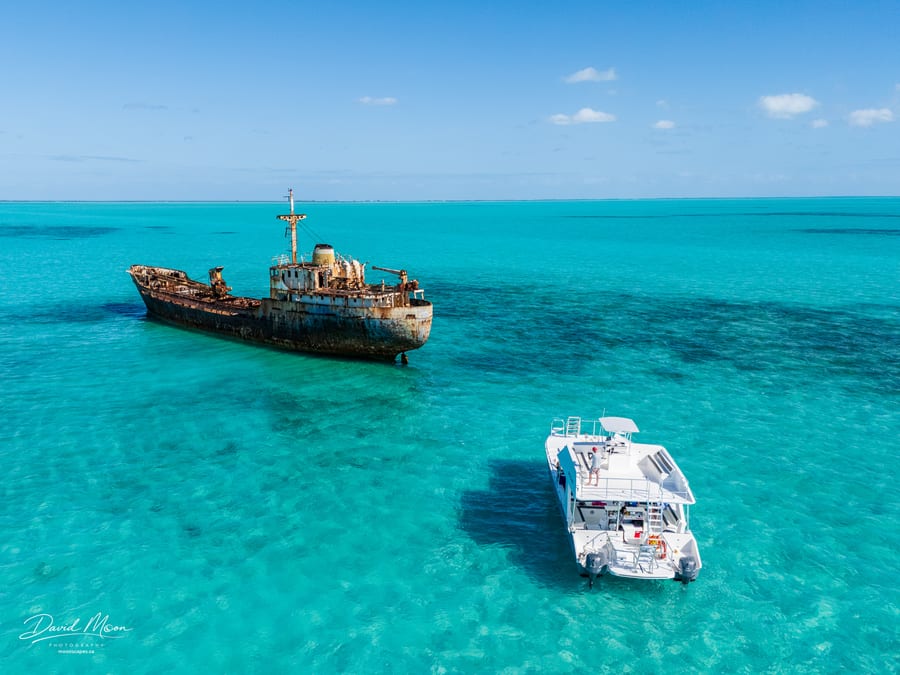 Tour Boat beside La Famille Express