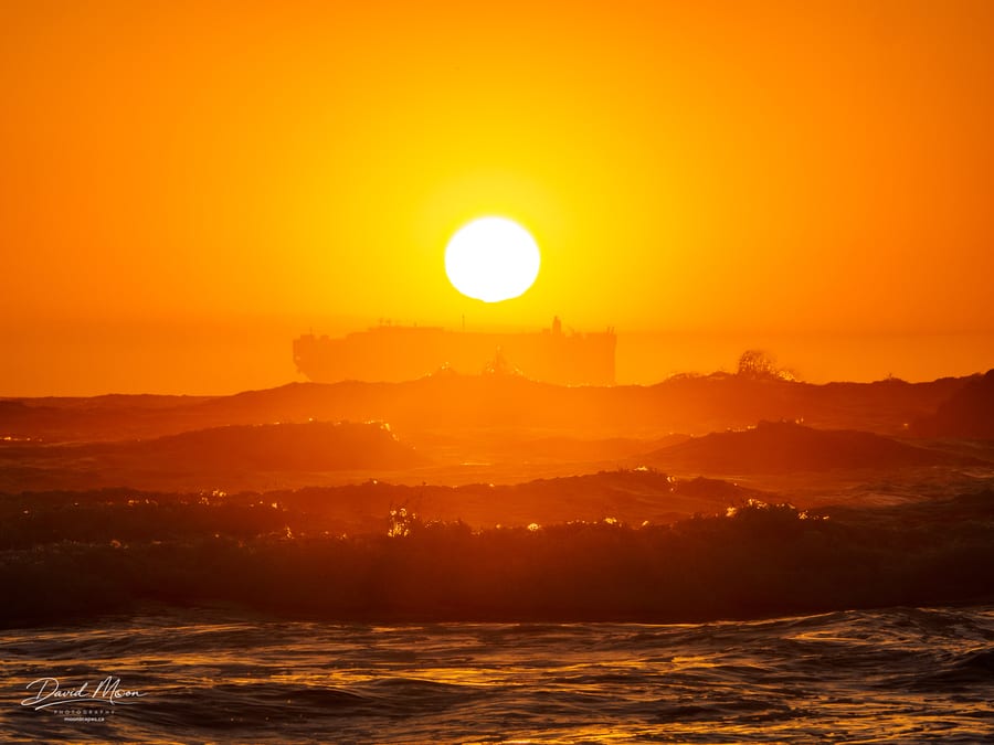 Ship beneath the Setting Sun